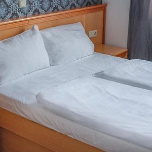 Kamer met een Queen Size Bed